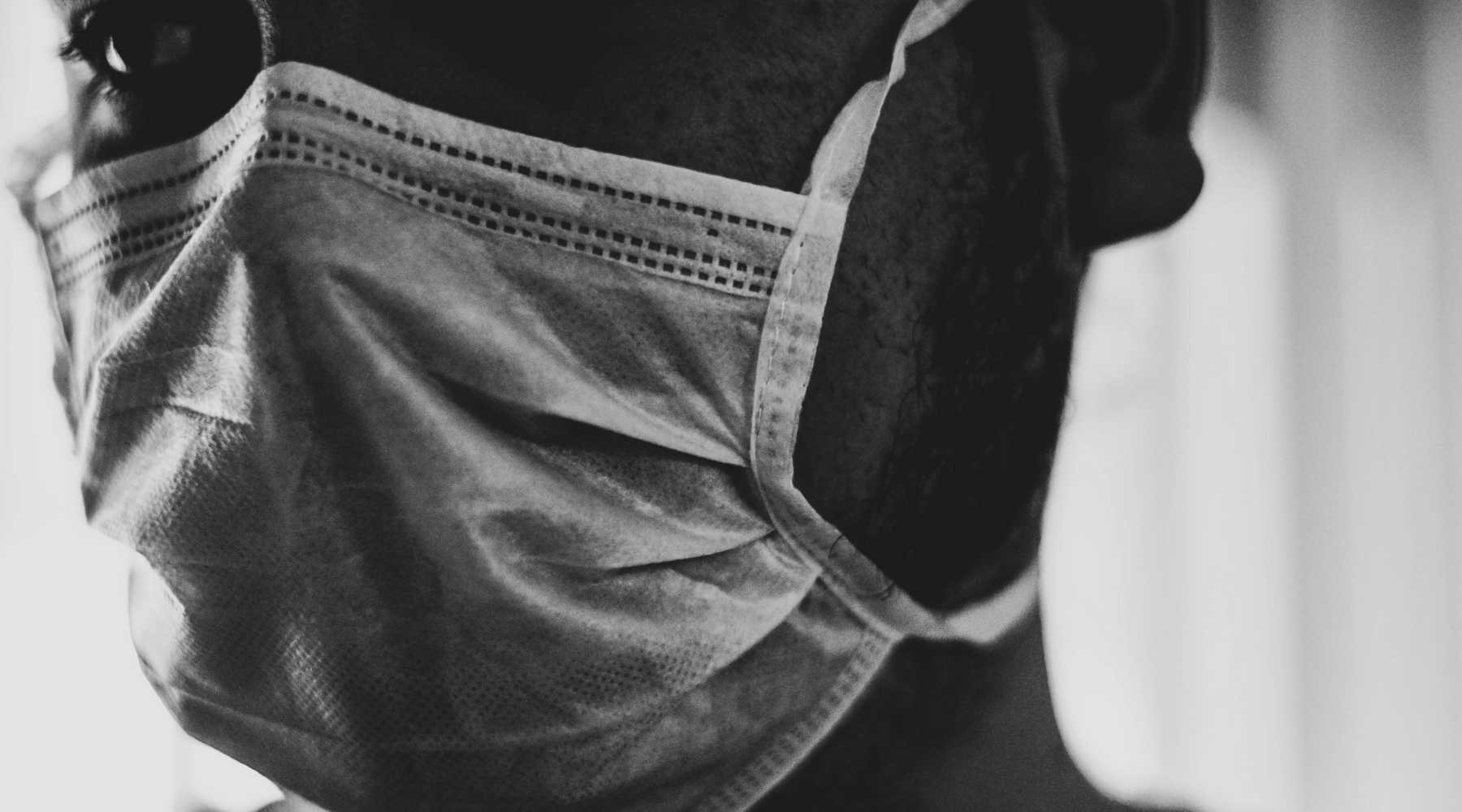 Man wearing face covering