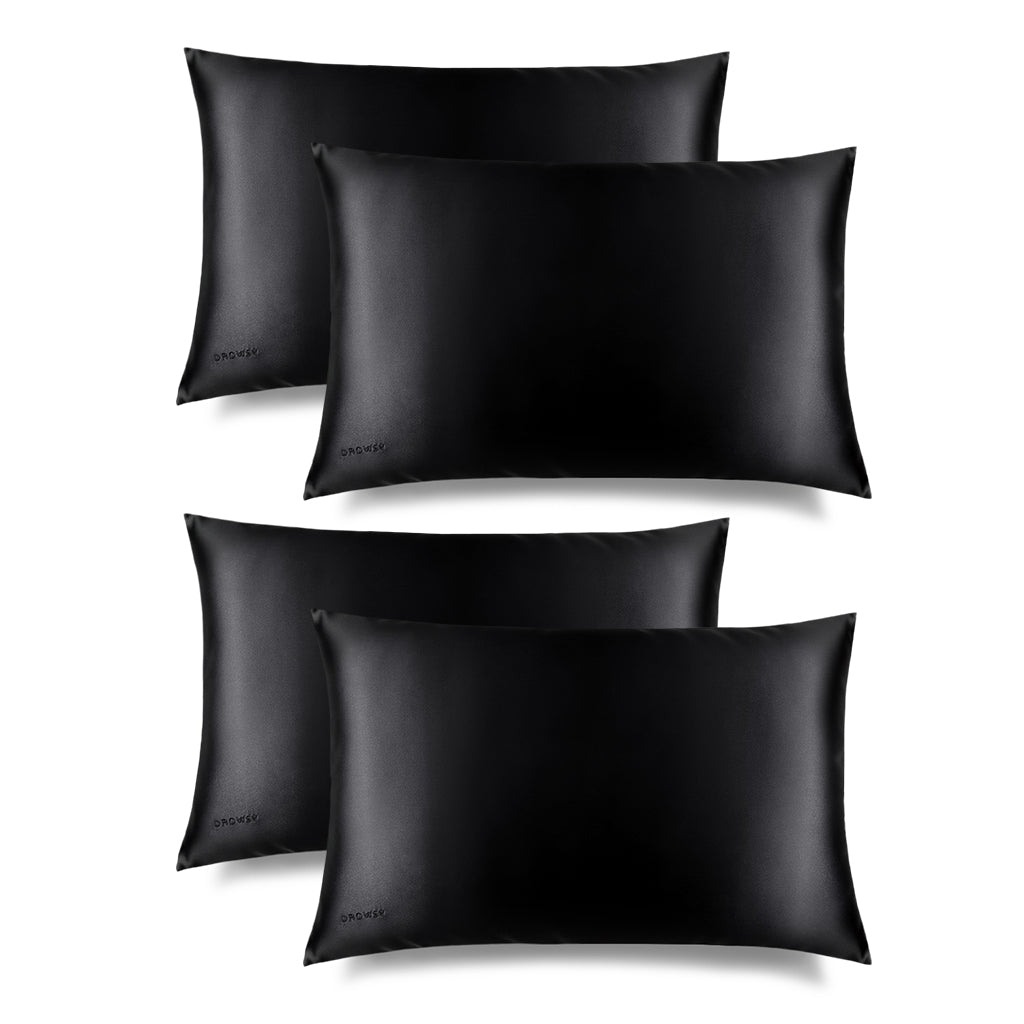 Four drowsysleepco Black Jade Silk Pillowcases are arranged in two rows on a white background. Each smooth, shiny case features a small corner logo and is designed for hair protection and to enhance your skincare routine.