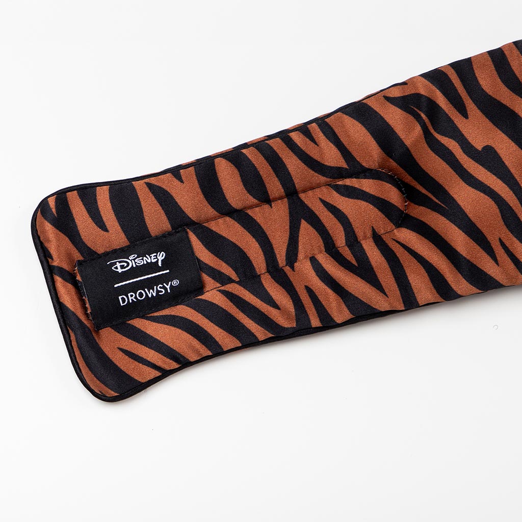 The Rajah Sleep Mask by drowsysleepco features brown and black zebra stripes, a blackout design, and a black "Disney Drowsy" label displayed on a white background.