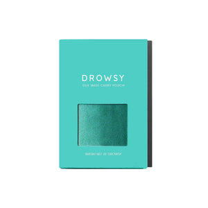 A turquoise box labeled Breakfast at Drowsy Carry Pouch by drowsysleepco features a small window showing mulberry silk, with the product name displayed near the bottom.