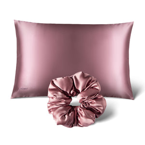 The Perfect Hair Bundle Pink Damask Rose by drowsysleepco features a pink silk pillowcase and matching scrunchie—ideal for reducing bed hair and adding a touch of luxury to your routine.