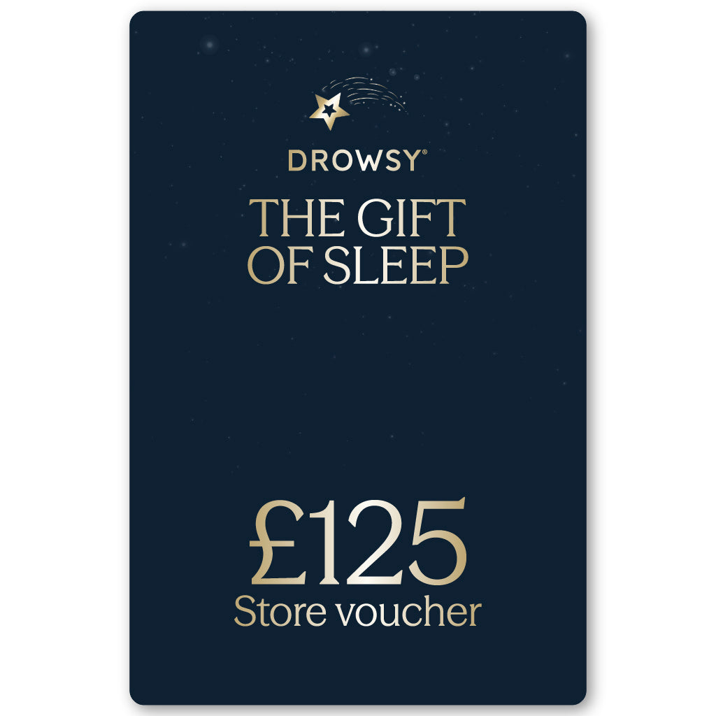 The Sleep Gift Card by drowsysleepco features dark blue with gold text, “Drowsy The Gift of Sleep” at the top, “£125 Store voucher” at the bottom, and a gold shooting star logo—perfect for gifting rest from our online store.