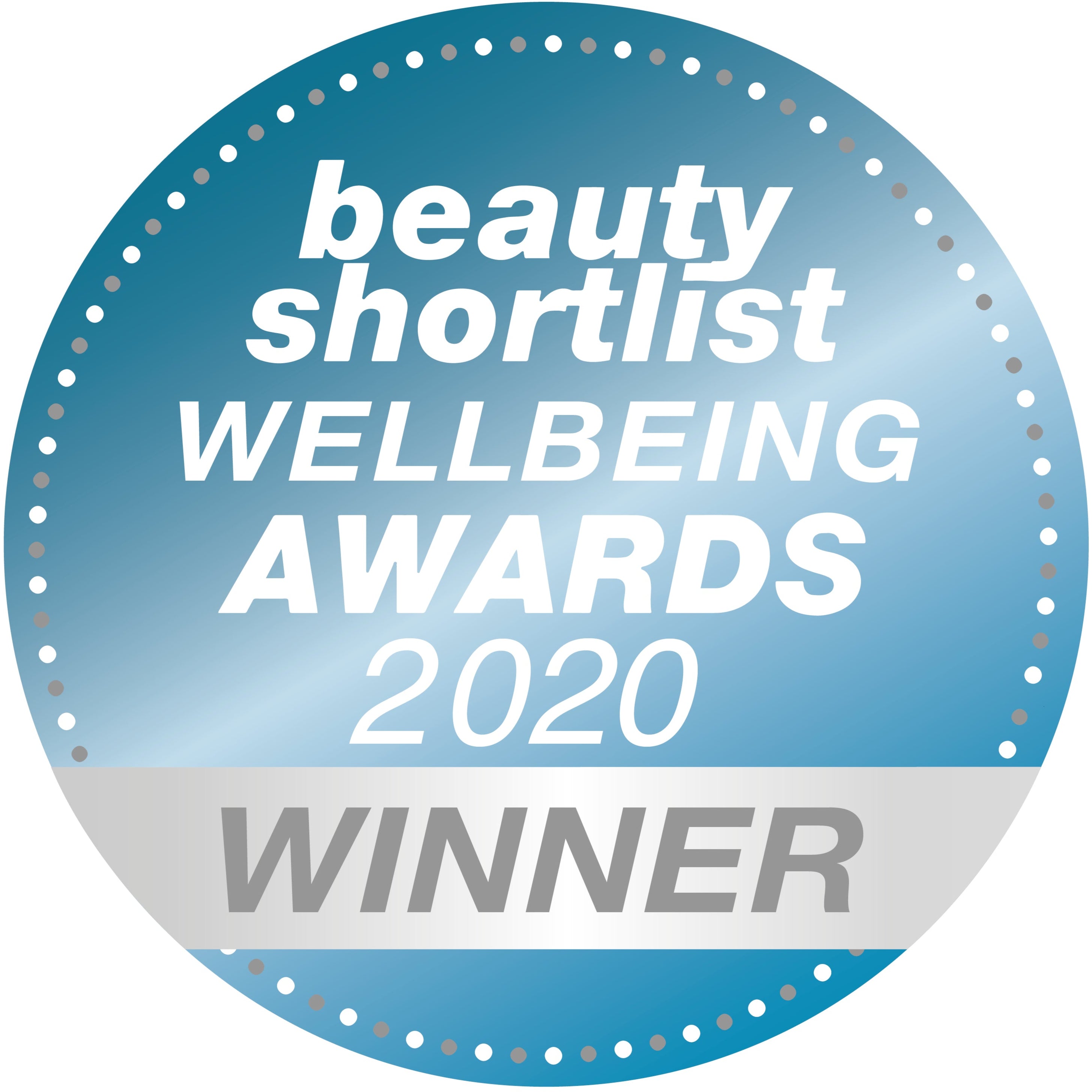 A blue circular badge with white text reads beauty shortlist WELLBEING AWARDS 2020 and a silver ribbon at the bottom displays WINNER in bold letters.