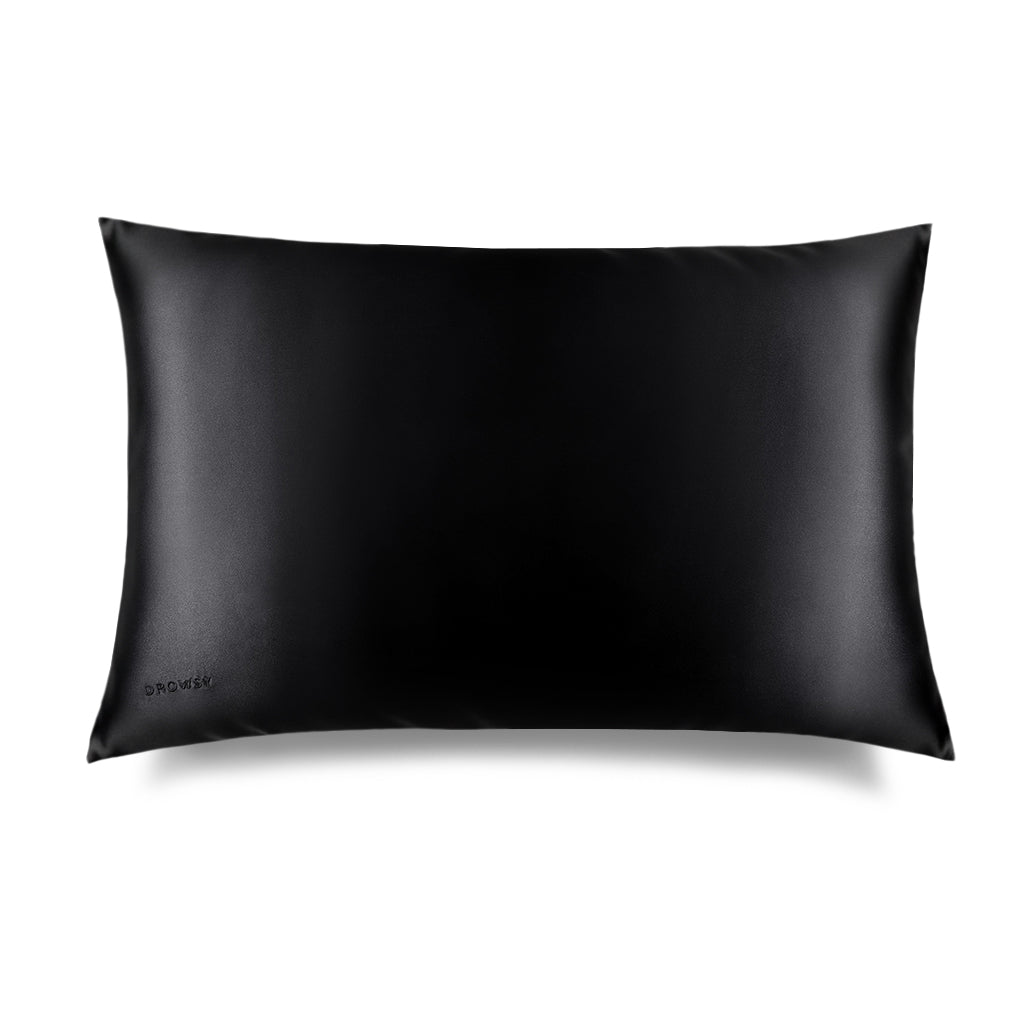 The Black Jade Silk Pillowcase by drowsysleepco, featuring a smooth, shiny texture, is shown on a white background. Perfect for hair protection and beauty routines, the brand appears subtly in small letters in the lower left corner.