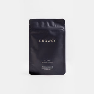 A black resealable pouch labeled drowsysleepco Sleep Supplement - 10 Capsules pack, a food supplement designed to support restful sleep and refreshed mornings, is shown standing upright against a plain white background.