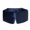 The Midnight Blue sleep mask by drowsysleepco features thick, padded sides and DROWSY embroidery on the front. Made from dark blue mulberry silk, it is designed to block out light completely for restful sleep.