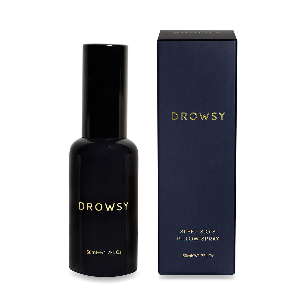 A black Drowsy Sleep SOS spray (50ml/1.7fl oz) stands beside its dark box. Pair with drowsysleepco’s Midnight ritual bundle Midnight Blue for the ultimate bedtime ritual.