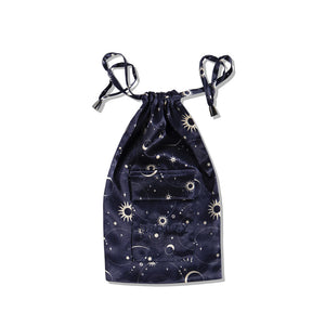 The drowsysleepco Cosmic Energy Silk Carry Pouch is a dark blue mulberry silk pouch with a cosmic white star, sun, and moon pattern, front pocket for your sleep mask, and metallic-tipped drawstrings for an elegant touch.