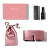 The Damask Rose Deep Sleep Collection by drowsysleepco includes a pink silk sleep mask, matching satin pouch, and deep sleep pillow spray in a black bottle, all beautifully arranged in elegant boxes on a white background.