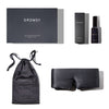 The drowsysleepco Moonlight Shadow Deep Sleep Collection includes a black box, luxury silk sleep mask, black drawstring pouch, and deep sleep pillow spray, all beautifully arranged on a white background.