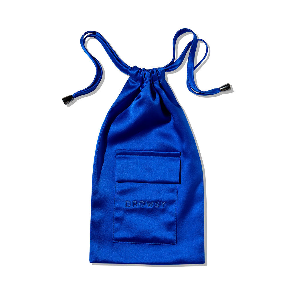 The drowsysleepco Royal Blue Silk Carry Pouch features “DROWSY” embroidery on the front pocket and a secure drawstring closure, shown against a white background.