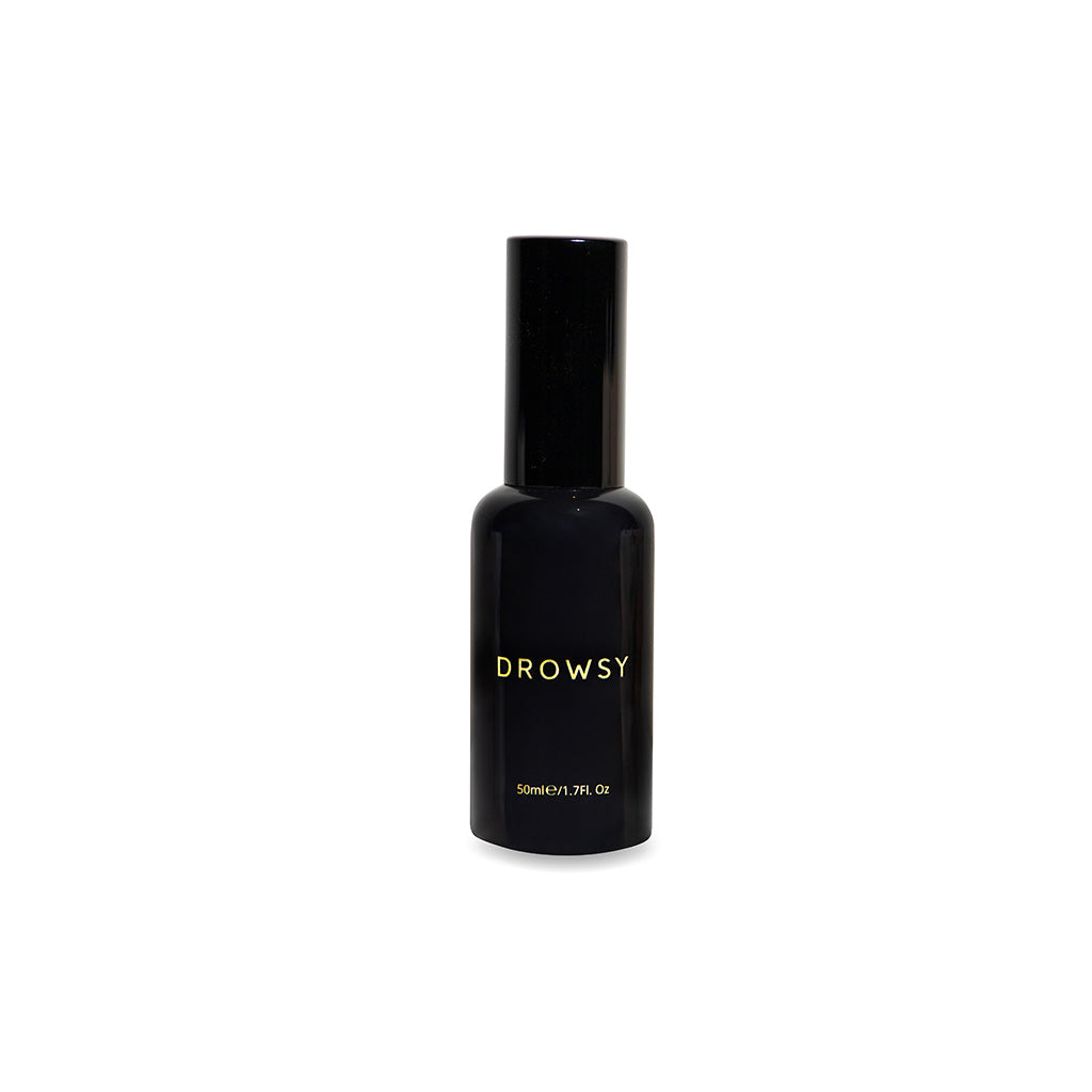 A sleek black bottle labeled "Sleep S.O.S Pillow Spray" by drowsysleepco stands upright on a white background. This 50ml/1.7 fl. oz cylindrical spray features a matching black cap, perfect for your nightly ritual.