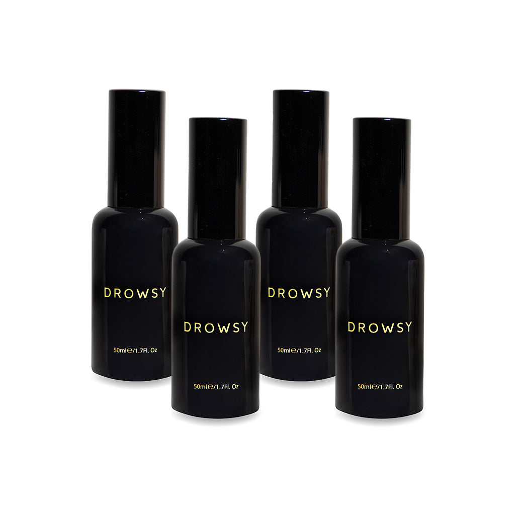 Four black bottles labeled "drowsysleepco Sleep S.O.S Pillow Spray," each 50ml (1.7 fl oz), stand upright against a white background—natural sleep aid, perfect for your nighttime ritual.